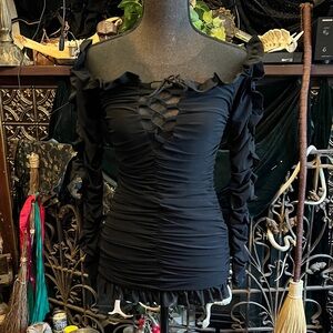 Stretch mesh ruched bodycon mini dress with ruffle long sleeve and lace up front